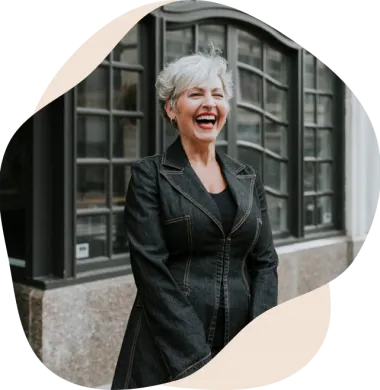 woman happily surviving hot flashes and night sweats