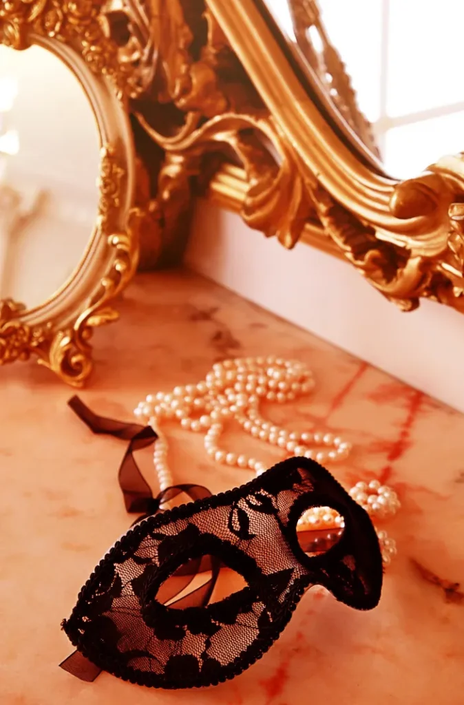 Magic Mask metaphor - mask sitting on a vanity in front of a mirror